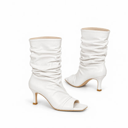 BOTA ESCÁNDALO BLANCO