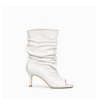 BOTA ESCÁNDALO BLANCO